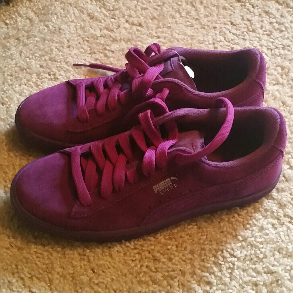Purple puma sneakers